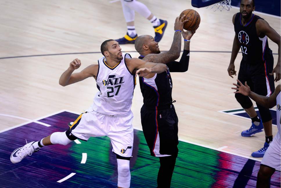 Scott Sommerdorf | The Salt Lake Tribune
Utah Jazz center Rudy Gobert (27) is too late to grab this rebound from LA Clippers center Marreese Speights (5) during first quarter play. The Utah Jazz trailed the LA Clipper 26-24 at the end of the first period of Game 4 of the Western Conference playoffs, Sunday, April 23, 2017.