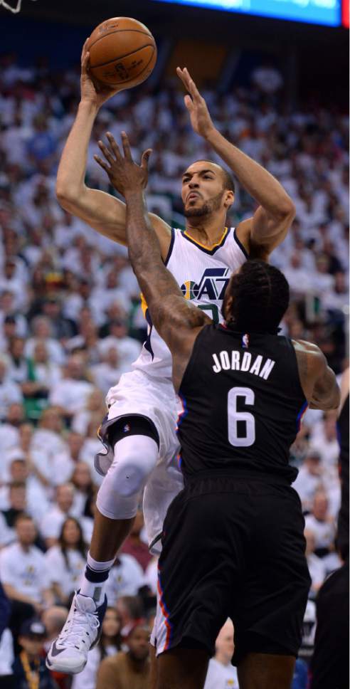 Steve Griffin  |  The Salt Lake Tribune


Utah Jazz center Rudy Gobert (27) glides in for two aver LA Clippers center DeAndre Jordan (6) during the Jazz versus Clippers NBA playoff game at Viviint Smart Home arena in Salt Lake City Sunday April 23, 2017.