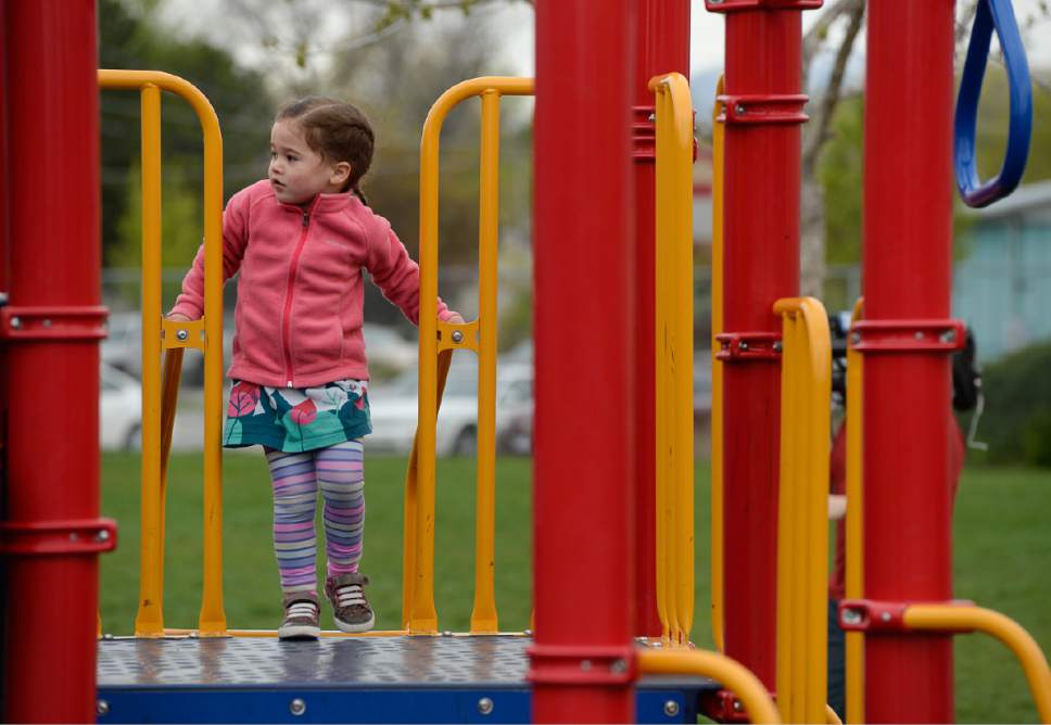 Francisco Kjolseth | The Salt Lake Tribune
Aida Cleverly, 3, visits the playground at Woodrow Wilson Elementary in Salt Lake on Monday. Next week is National Playground Safety Week and the health department is looking to promote safe practices on the playgrounds as they perform inspections. The health department released a new study showing that 67 percent of Utah elementary student (grades K-6) injuries that take place at school are on the playground.