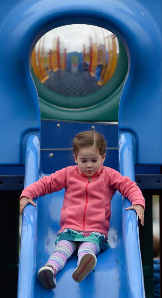 Francisco Kjolseth | The Salt Lake Tribune
Aida Cleverly, 3, visits the playground at Woodrow Wilson Elementary in Salt Lake on Monday. Next week is National Playground Safety Week and the health department is looking to promote safe practices on the playgrounds as they perform inspections. The health department released a new study showing that 67 percent of Utah elementary student (grades K-6) injuries that take place at school are on the playground. About 1700 elementary school students were injured each year from 2012 to 2015, enough to fill 24 school busses.