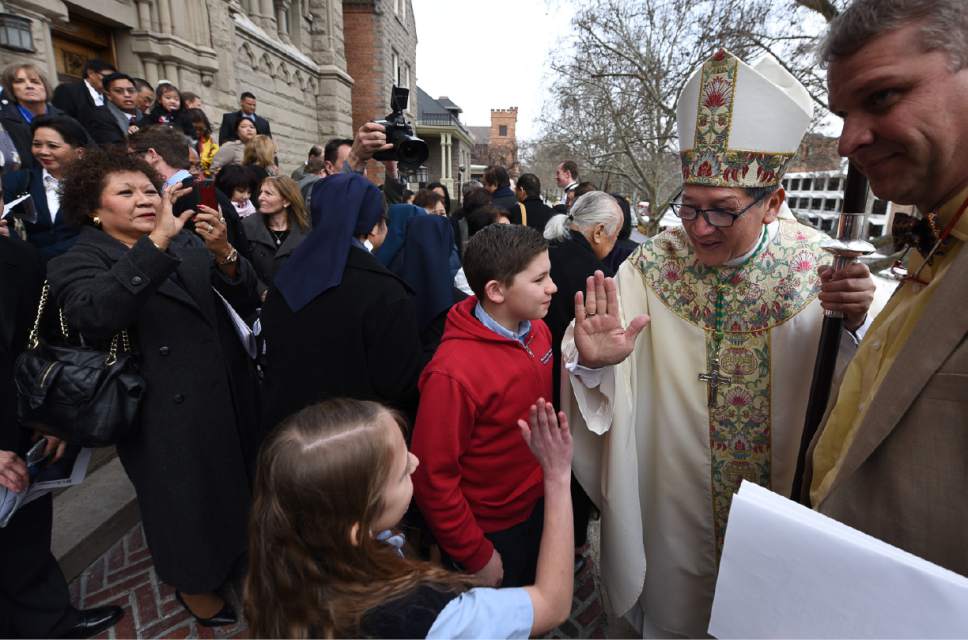 Francisco Kjolseth | The Salt Lake Tribune
Newly installed Bishop Oscar A. Solis greets his congregation following cervices at the Cathedral of the Madeleine on Tuesday, March 7, 2017.