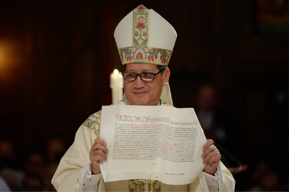 Francisco Kjolseth | The Salt Lake Tribune
Bishop Oscar A. Solis presents the Apostolic Letter from Pope Francis that officially appoints him as the 10th bishop of the Diocese of Salt Lake City.