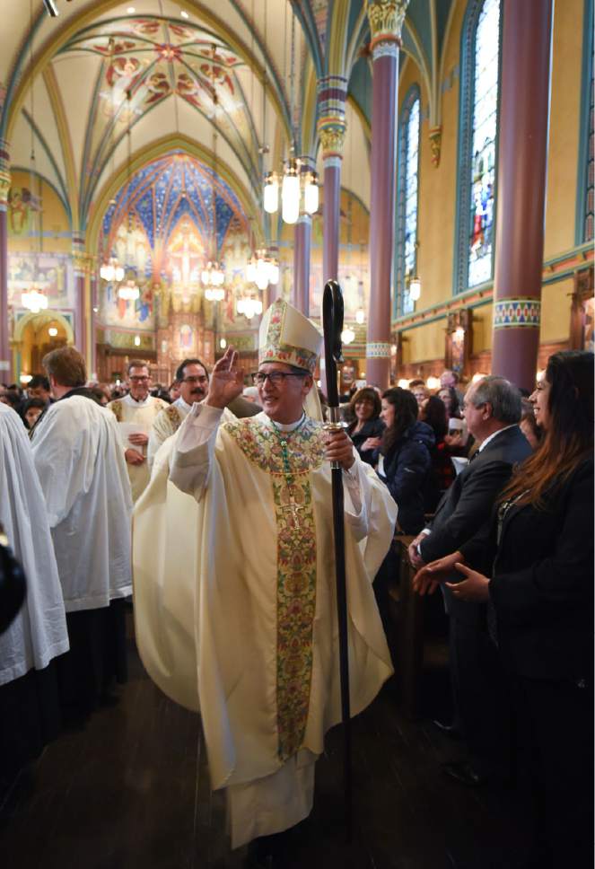 Francisco Kjolseth | The Salt Lake Tribune
Bishop Oscar A. Solis greets the congregation following his installment as the 10th bishop of the Diocese of Salt Lake City at the Cathedral of the Madeleine on Tuesday, March 7, 2017.