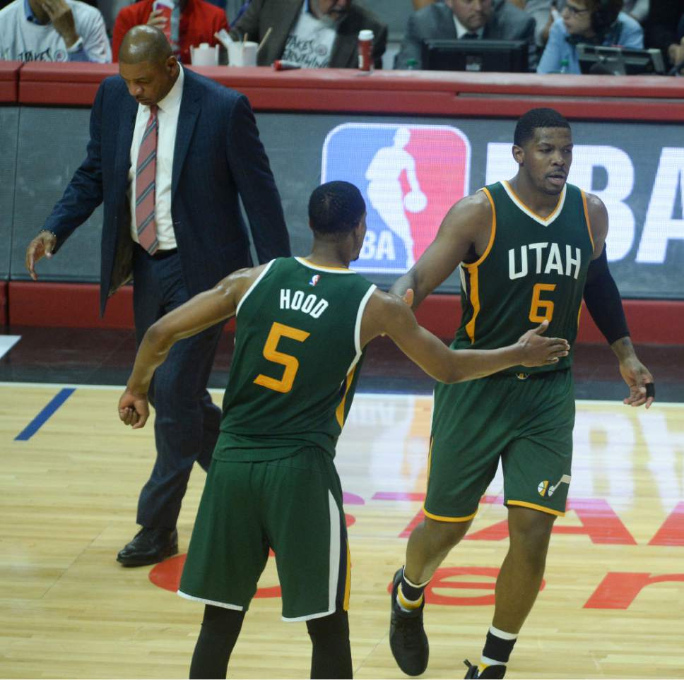 Steve Griffin  |  The Salt Lake Tribune


Utah Jazz guard Rodney Hood (5) slaps hands with Utah Jazz forward Joe Johnson (6) after Johnson made a basket late in game 5 of the the Jazz versus Clippers NBA playoff game at the Staples Center in Los Angeles Tuesday April 25, 2017.