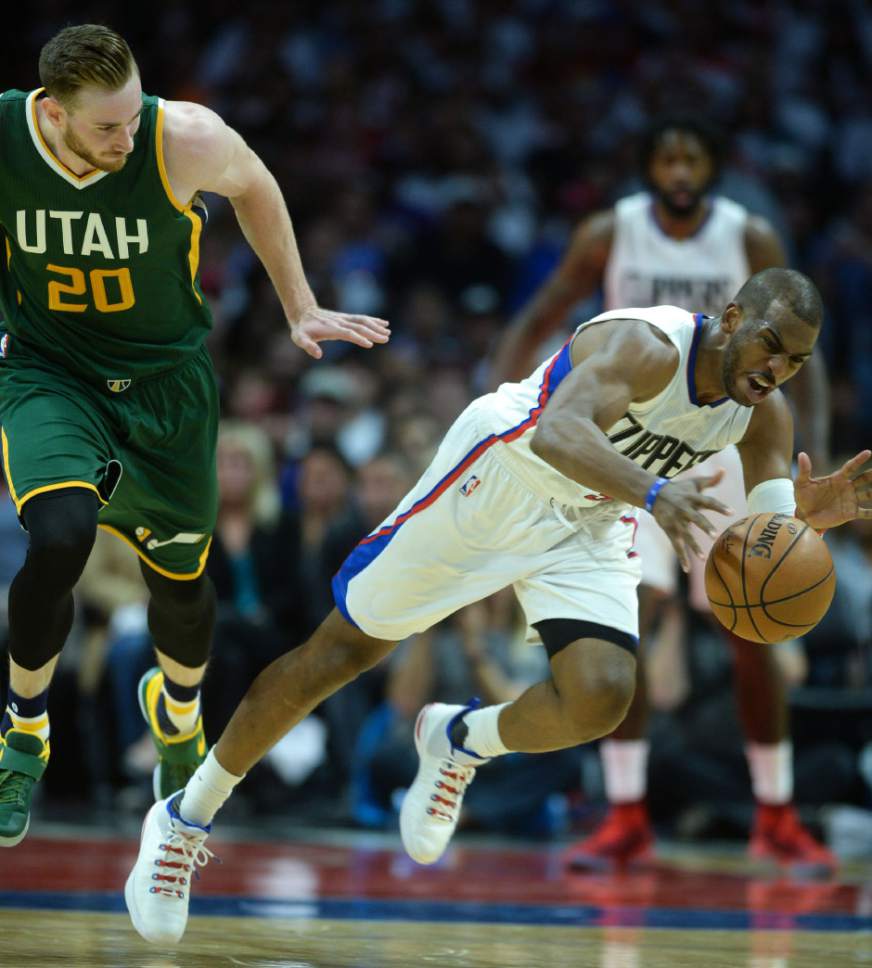 Steve Griffin  |  The Salt Lake Tribune


LA Clippers guard Chris Paul (3) scoops up a loose ball in front of Utah Jazz forward Gordon Hayward (20) during game 5 of the the Jazz versus Clippers NBA playoff game at the Staples Center in Los Angeles Tuesday April 25, 2017.