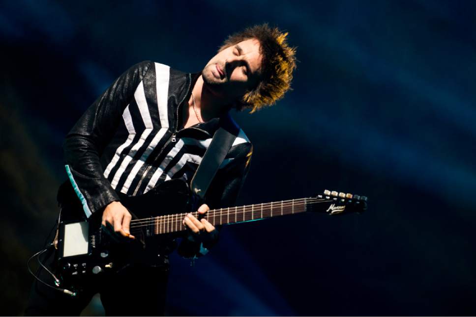 Lead singer and guitarist Matthew Bellamy of Muse performs at the Energy Solutions Arena in Salt Lake City, on Sept. 20, 2013. (Molly J. Smith | Special to The Salt Lake Tribune)