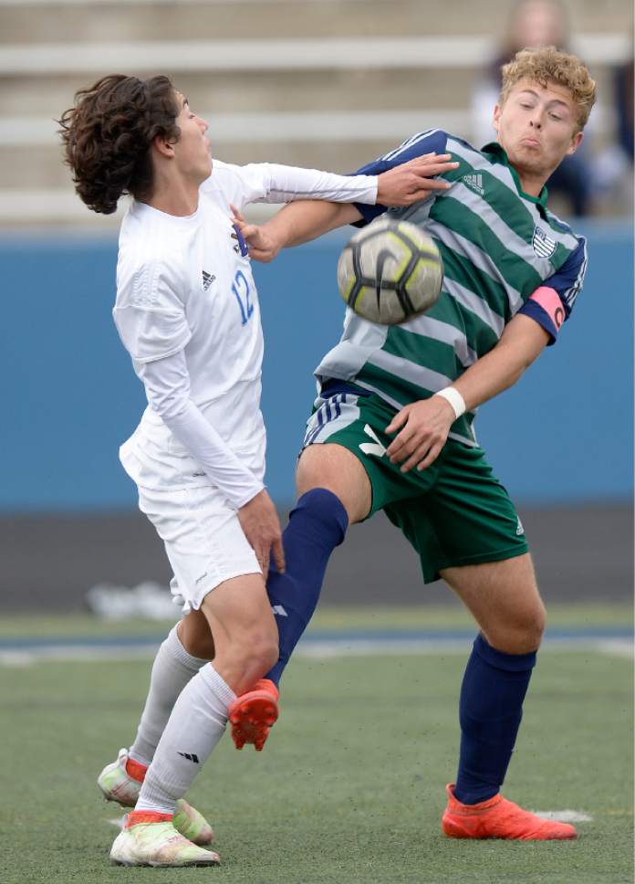 Leah Hogsten  |  The Salt Lake Tribune 
Bingham's Jacob Angeletti and Copper Hills' Aaron Nixon give each other a little shove. Bingham High School boys' soccer team defeated Copper Hills High School 2-1, during their game April 25, 2017.