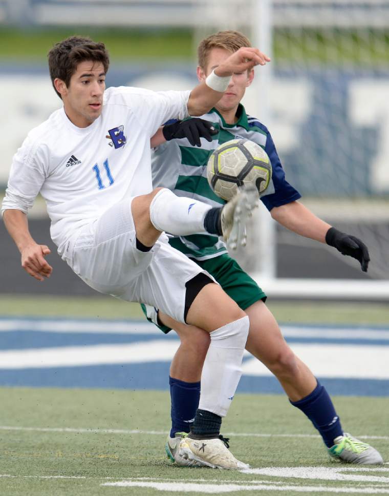 Leah Hogsten  |  The Salt Lake Tribune 
Bingham's Tommy Merniez meets Copper Hills' Jeff Nigbur.  Bingham High School boys' soccer team defeated Copper Hills High School 2-1, during their game April 25, 2017.