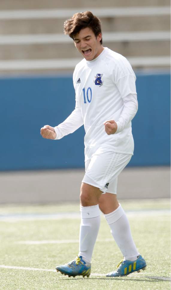 Leah Hogsten  |  The Salt Lake Tribune 
Bingham's Leo Sobreira celebrates his second of two game winning goals with teammates. Bingham High School boys' soccer team defeated Copper Hills High School 2-1, during their game April 25, 2017.