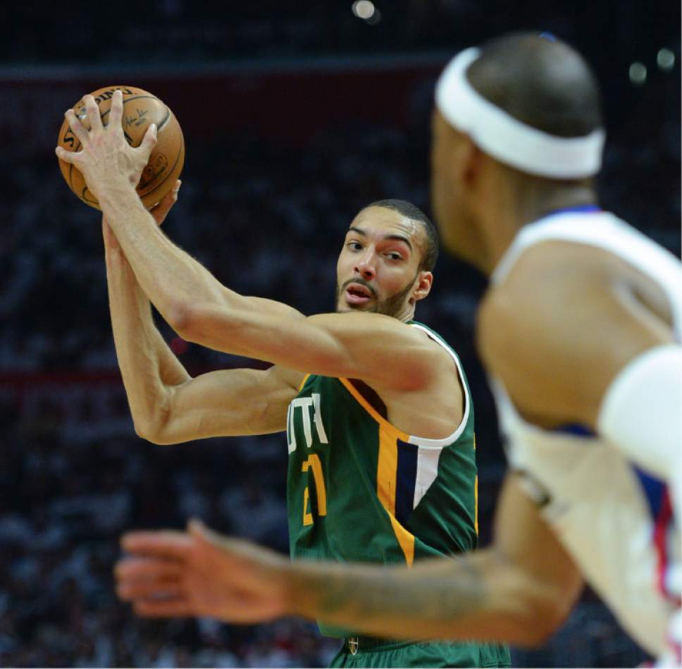 Steve Griffin  |  The Salt Lake Tribune


Utah Jazz center Rudy Gobert (27) keeps the ball high as he looks to pass during game 5 of the the Jazz versus Clippers NBA playoff game at the Staples Center in Los Angeles Tuesday April 25, 2017.