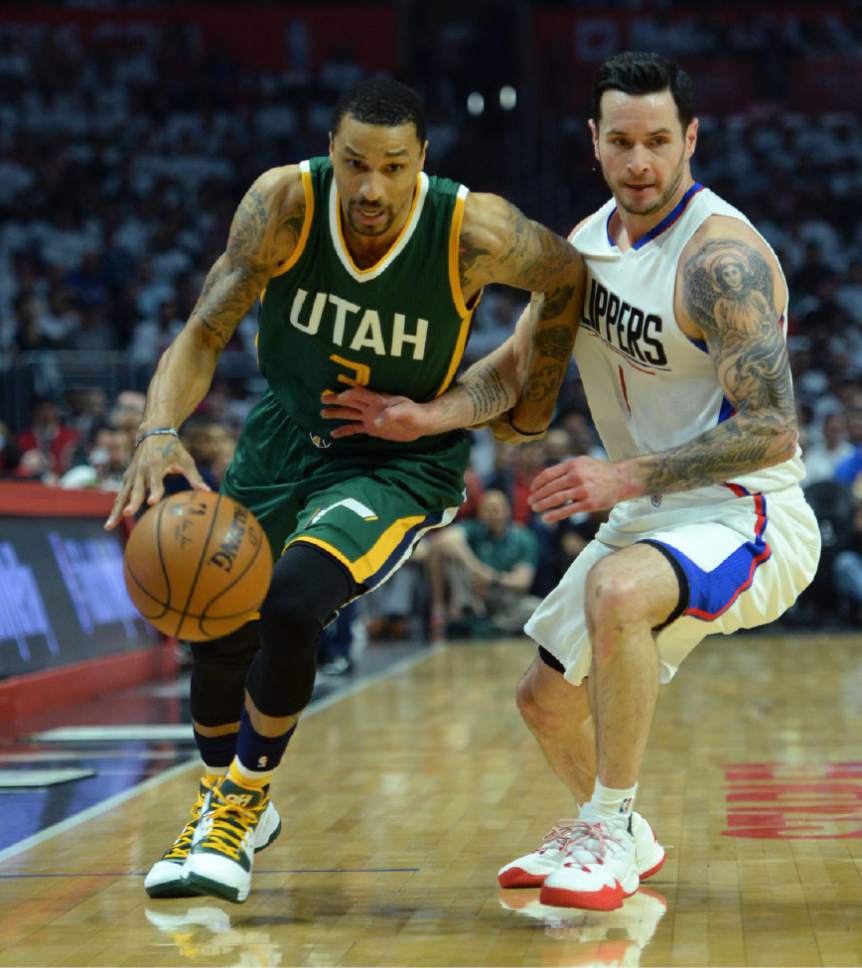 Steve Griffin  |  The Salt Lake Tribune


Utah Jazz guard George Hill (3) drives on LA Clippers guard JJ Redick (4) during game 5 of the the Jazz versus Clippers NBA playoff game at the Staples Center in Los Angeles Tuesday April 25, 2017.