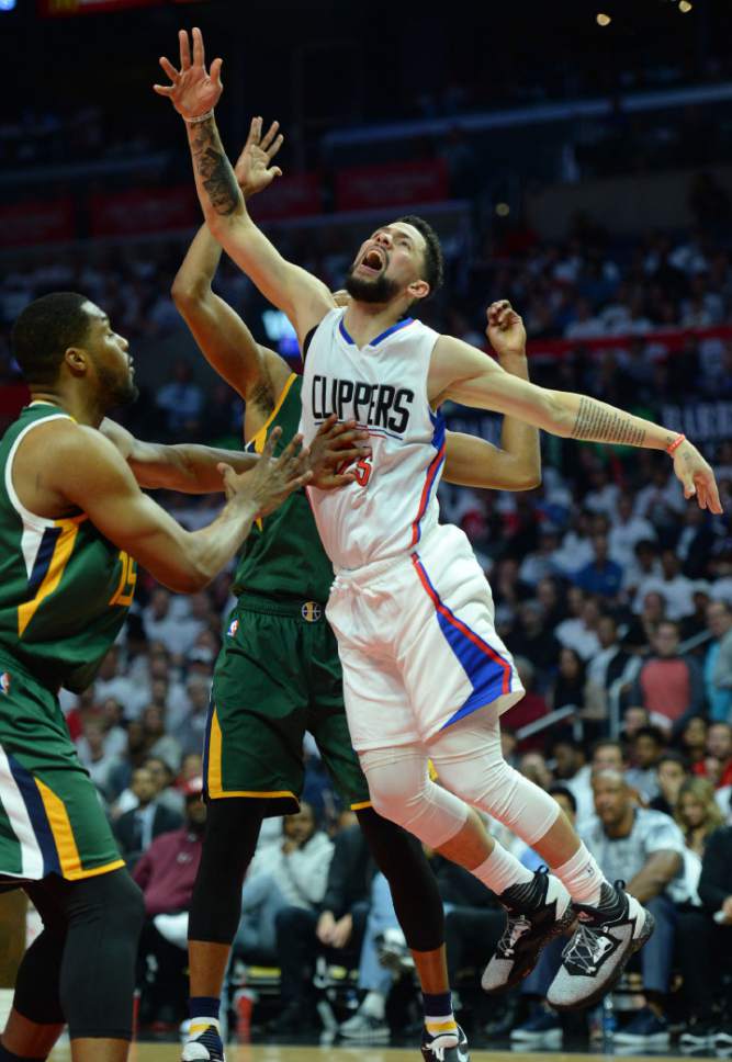 Steve Griffin  |  The Salt Lake Tribune


LA Clippers guard Austin Rivers (25) gets fouled as he goes tot the basket during game 5 of the the Jazz versus Clippers NBA playoff game at the Staples Center in Los Angeles Tuesday April 25, 2017.