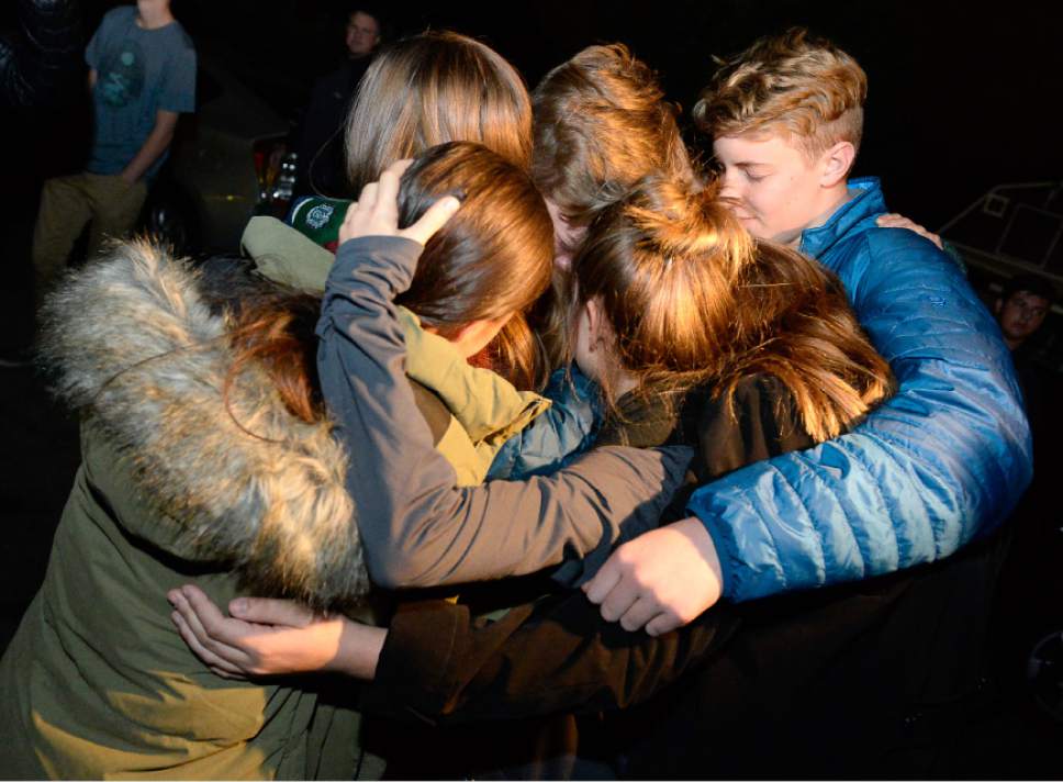 Francisco Kjolseth | The Salt Lake Tribune
Friends embrace as they attend a vigil at Draper City Park on Sunday evening, Nov. 20, 2016, in remembrance of teens Lexie Fenton and Ethan Fraga, both 16, who were killed in a single-car accident in Draper Saturday night.