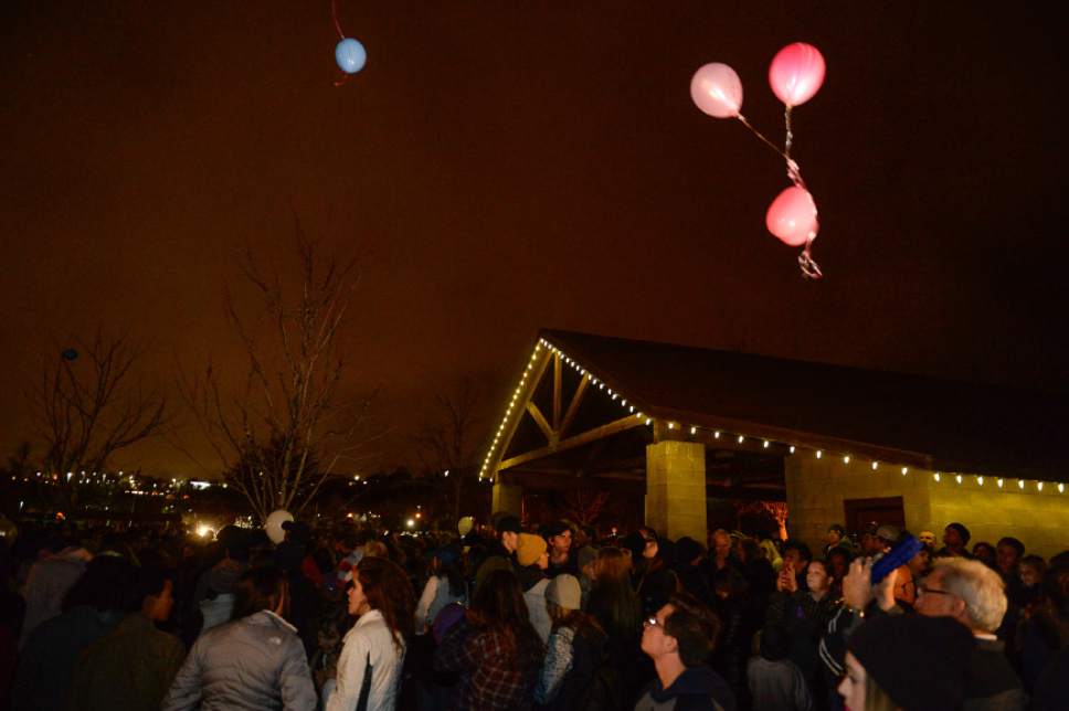 Francisco Kjolseth | The Salt Lake Tribune
Releasing inscribed balloons, friends and family gather for a vigil at Draper City Park on Sunday evening, Nov. 20, 2016, in remembrance of teens Lexie Fenton and Ethan Fraga, both 16, who were killed in a single-car accident in Draper Saturday night. Three other teens who were in the vehicle were injured when the driver lost control of the car.