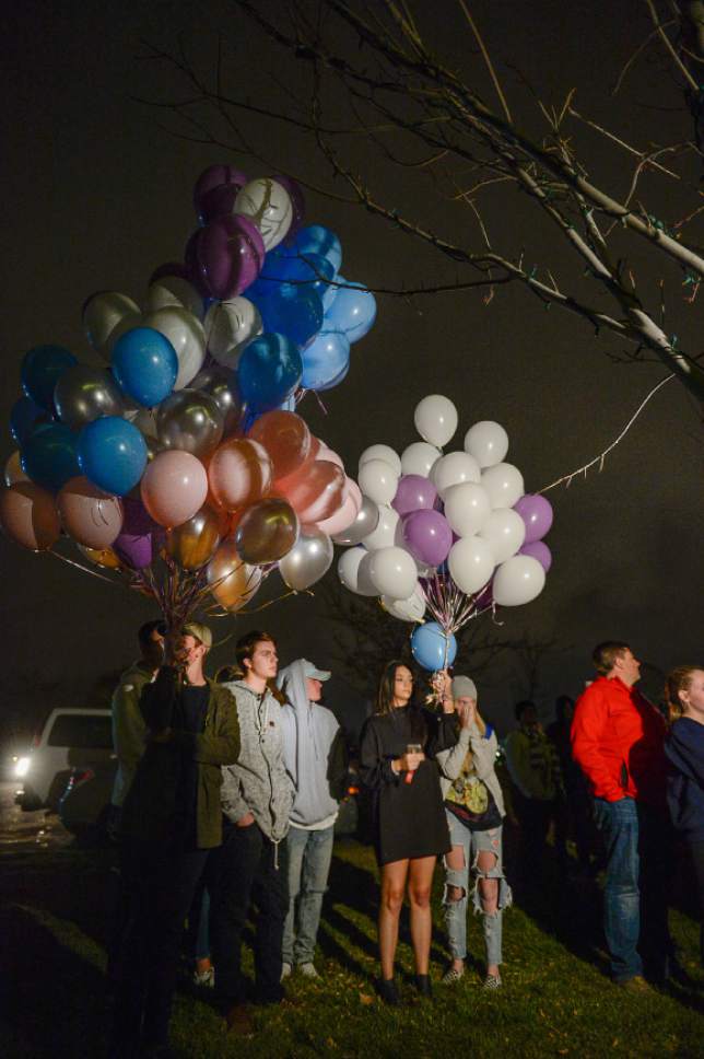 Francisco Kjolseth | The Salt Lake Tribune
Friends and family gather for a vigil at Draper City Park on Sunday evening, Nov. 20, 2016, in remembrance of teens Lexie Fenton and Ethan Fraga, both 16, who were killed in a single-car accident in Draper Saturday night.