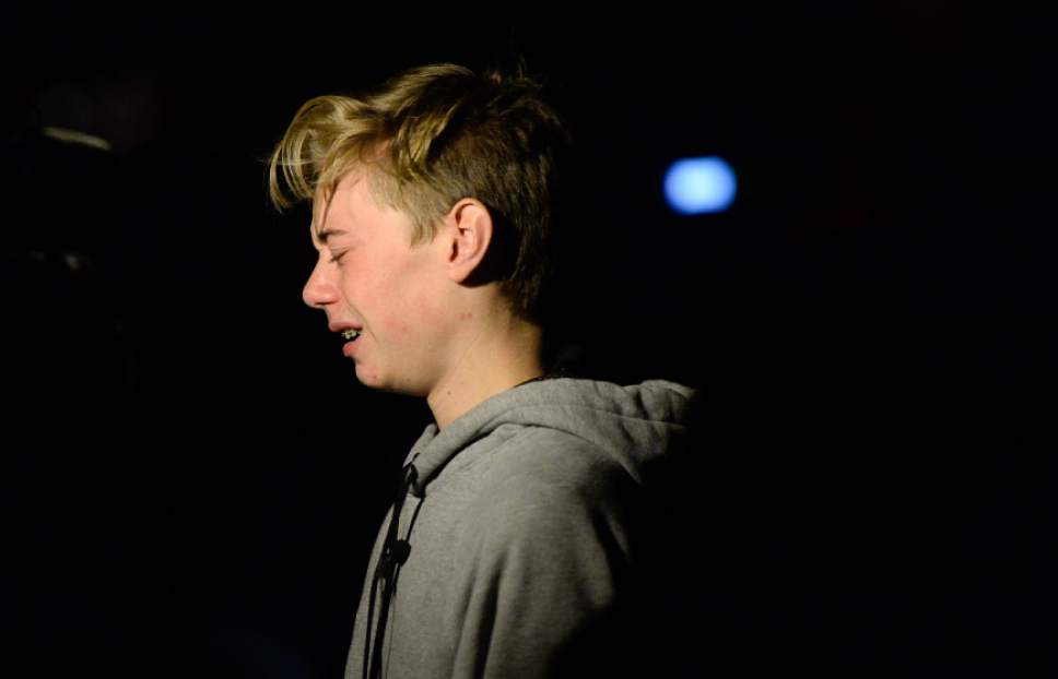 Francisco Kjolseth | The Salt Lake Tribune
Marty Bodell, 14, becomes emotional as he thinks about his friends who attended his church during a vigil at Draper City Park on Sunday evening, Nov. 20, 2016, in remembrance of teens Lexie Fenton and Ethan Fraga, both 16, who were killed in a single-car accident in Draper Saturday night.
