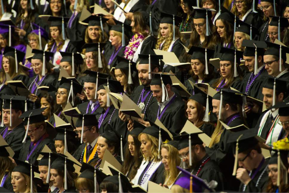 Rick Egan  |  The Salt Lake Tribune

Weber state graduates sing the school song during the Weber State Commencement Exercies at the Dee Events Center in Ogden, Friday, April 28, 2017.