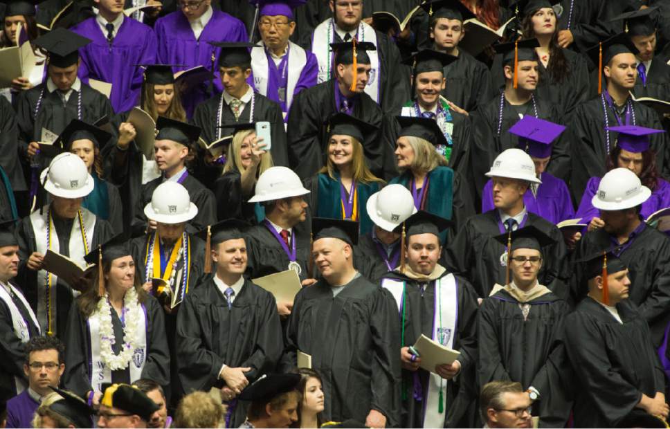 Rick Egan  |  The Salt Lake Tribune

Construction Management Technology graduates wear heard hats during the Weber State University graduation at the Dee Events Center in Ogden, Friday, April 28, 2017.