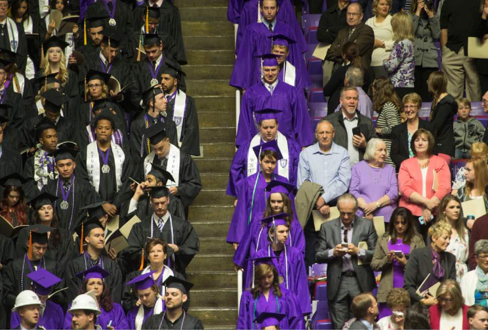 Rick Egan  |  The Salt Lake Tribune

Graduates file down the stairs at the Weber State University graduation at the Dee Events Center in Ogden, Friday, April 28, 2017.