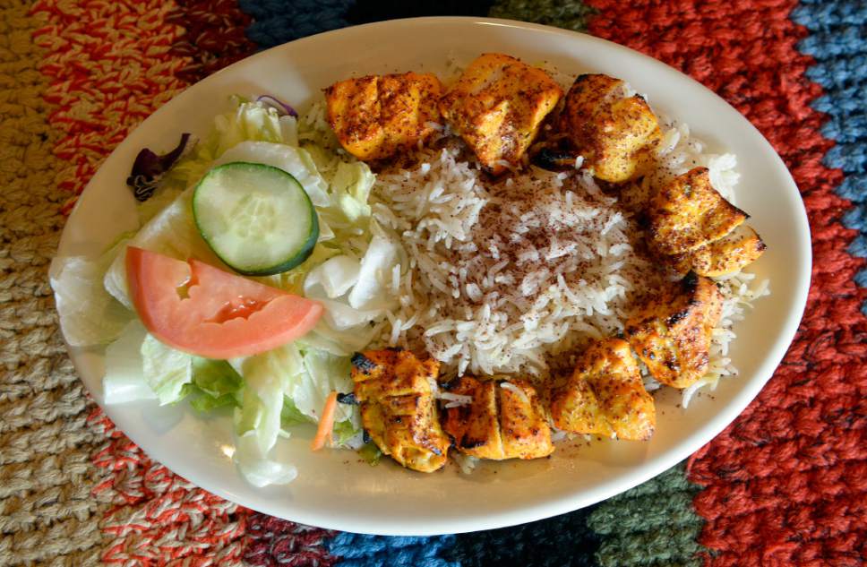 Al Hartmann  |  The Salt Lake Tribune
Dish of the week. Chicken Tikka Kabab, marinated boneless chicken breast barbequed over grill and served with rice and salad at Afghan Kitchen, a new restaurant in South Salt Lake.