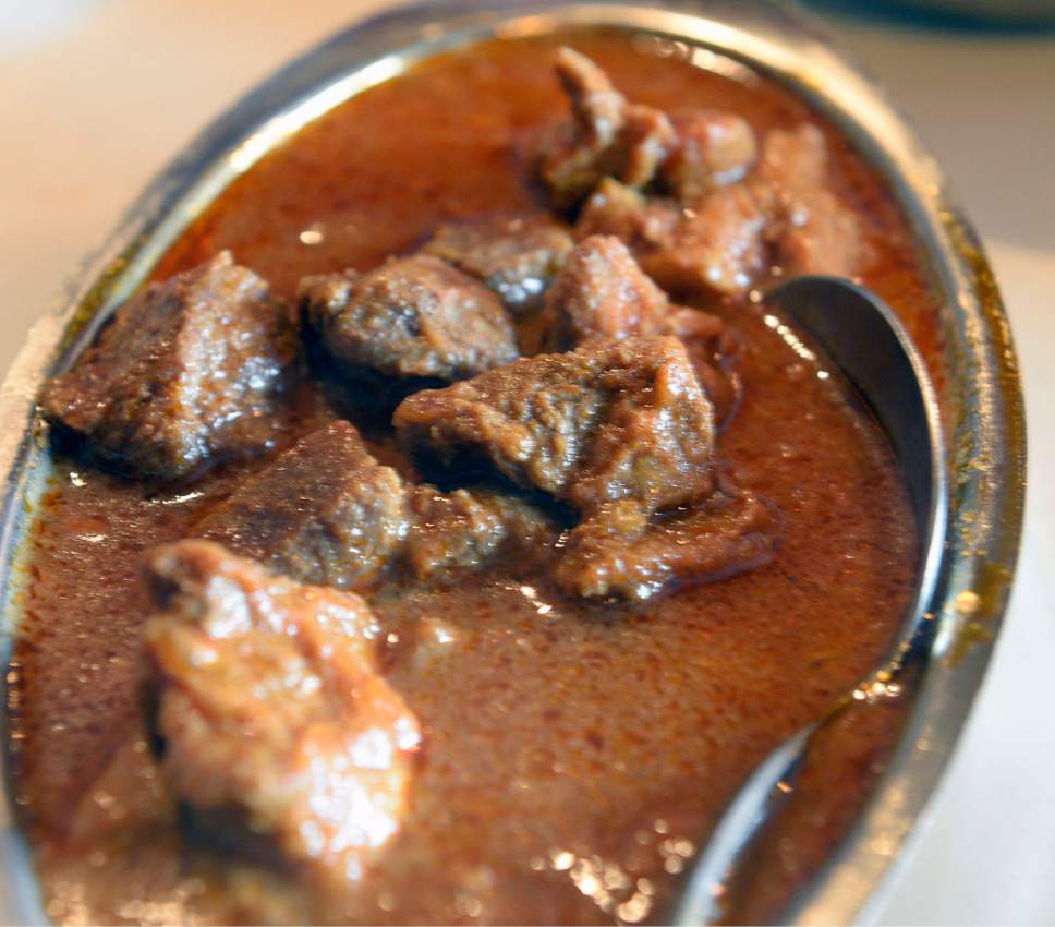 Al Hartmann  |  The Salt Lake Tribune
Lamb Curry, boneless lamb cooked with , tomatoes, garlic, ginger, onions and spices at Afghan Kitchen, a new restaurant in South Salt Lake.