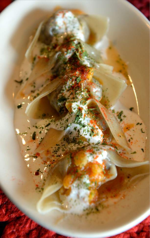 Al Hartmann  |  The Salt Lake Tribune
Mantu, an appetizer made with ground beef, onion and spices wrapped in a homemade flour pastry dough and steamed, then topped with split peas and yogurt sauce at Afghan Kitchen, a new restaurant in South Salt Lake.