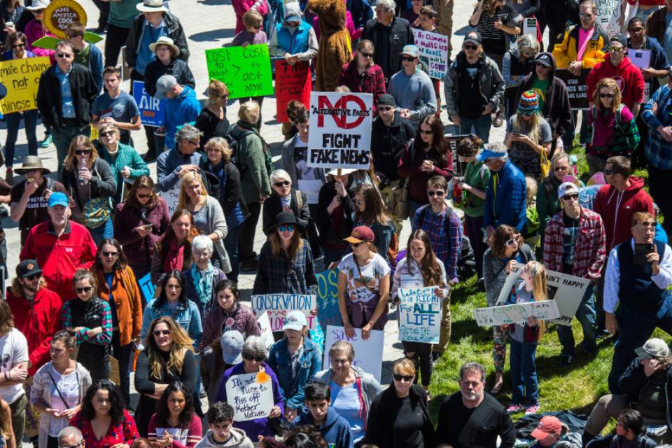 Chris Detrick  |  The Salt Lake Tribune
Participants rally at the Salt Lake City library during the Utah People's Climate March Saturday, April 29, 2017.