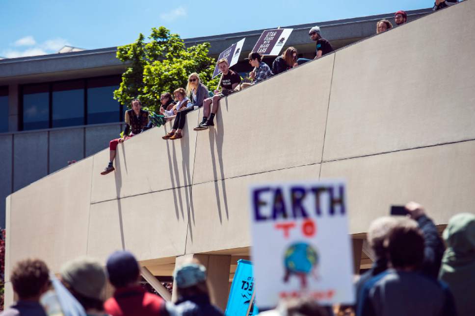 Chris Detrick  |  The Salt Lake Tribune
Participants rally at the Salt Lake City library during the Utah People's Climate March Saturday, April 29, 2017.