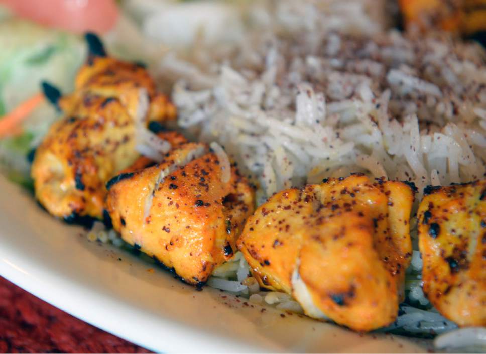 Al Hartmann  |  The Salt Lake Tribune
Chicken Tikka Kabab, marinated boneless chicken breast barbequed over grill and served with rice and salad at Afghan Kitchen, a new restaurant in South Salt Lake.