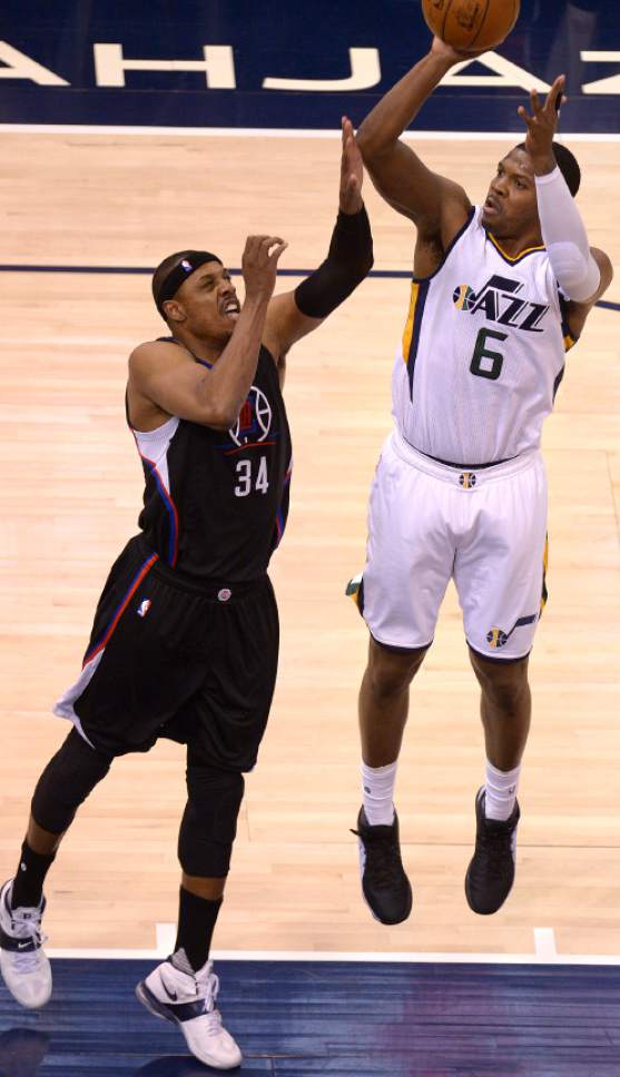 Leah Hogsten  |  The Salt Lake Tribune 
Utah Jazz forward Joe Johnson (6) shoots around LA Clippers forward Paul Pierce (34). The Utah Jazz trail the Los Angeles Clippers 59-62 in the third quarter during Game 6 at Vivint Smart Home Arena, Friday, April 28, 2017 during the NBA's first-round playoff series.