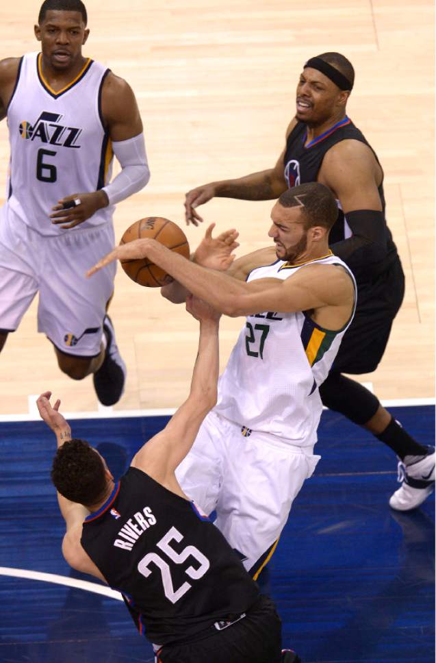 Leah Hogsten  |  The Salt Lake Tribune 
Utah Jazz center Rudy Gobert (27) battles LA Clippers guard Austin Rivers (25) in the paint. The Utah Jazz trail the Los Angeles Clippers 59-62 in the third quarter during Game 6 at Vivint Smart Home Arena, Friday, April 28, 2017 during the NBA's first-round playoff series.
