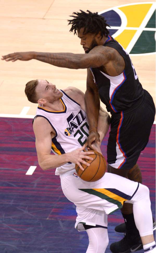 Leah Hogsten  |  The Salt Lake Tribune 
Utah Jazz forward Gordon Hayward (20) is fouled by LA Clippers center DeAndre Jordan (6). The Utah Jazz fall to the Los Angeles Clippers 93-98 during Game 6 at Vivint Smart Home Arena, Friday, April 28, 2017 during the NBA's first-round playoff series.