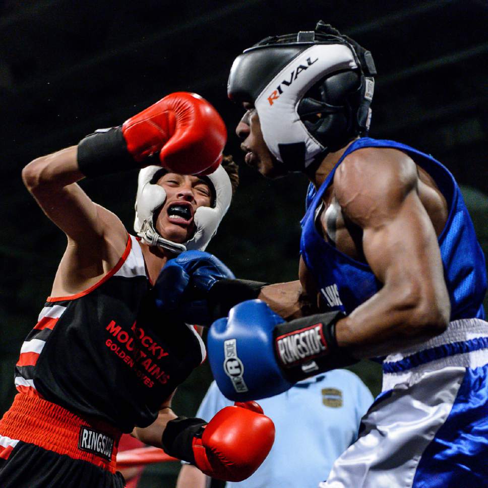 Trent Nelson  |  The Salt Lake Tribune
Diego Alvarez, Rocky Mountain (red), defeats Timothy Jarman, St. Louis, in boxing action at the Golden Gloves of America's 2016 National Tournament of Champions in Salt Lake City, Thursday May 19, 2016.
