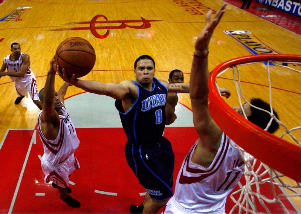 Chris Detrick  |  The Salt Lake Tribune

Deron Williams drives to the basket past Yao Ming during the 2007 playoffs.