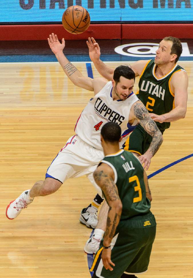 Trent Nelson  |  The Salt Lake Tribune
Utah Jazz forward Joe Ingles (2) knocks the ball away from LA Clippers guard JJ Redick (4) as the Utah Jazz face the Los Angeles Clippers in Game 7 at STAPLES Center in Los Angeles, California, Sunday April 30, 2017.