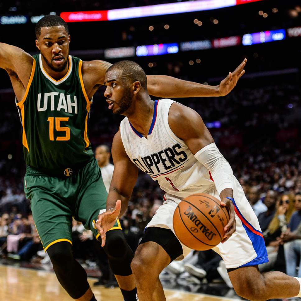 Trent Nelson  |  The Salt Lake Tribune
LA Clippers guard Chris Paul (3) drives on Utah Jazz forward Derrick Favors (15) as the Utah Jazz face the Los Angeles Clippers in Game 7 at STAPLES Center in Los Angeles, California, Sunday April 30, 2017.