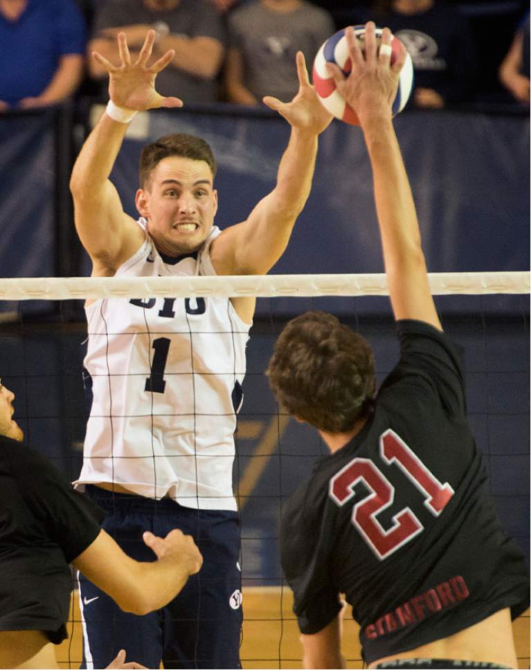 Rick Egan  |  The Salt Lake Tribune

COLIN MCCALL Colin McCall (21) Stanford, tries to get the ball past Price Jarman (1) BYU, in Volleyball action, BYU vs. Stanford, at the Smith Field House in Provo,  Saturday, April 15, 2017.