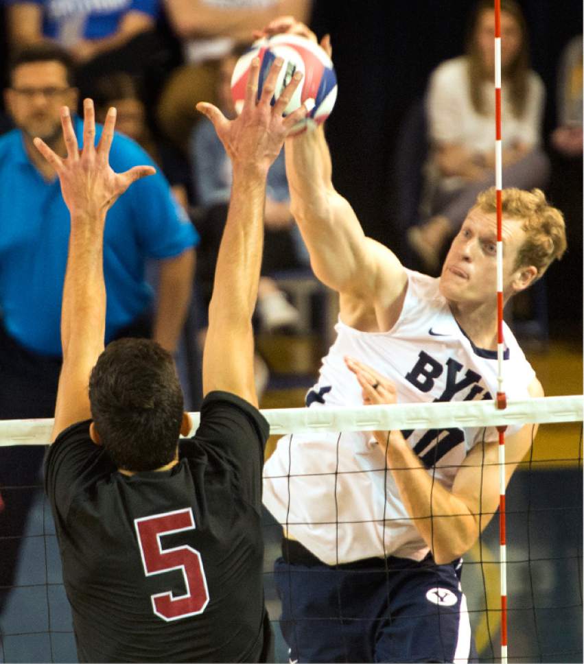 Rick Egan  |  The Salt Lake Tribune

Jake Langlois (10) BYU, tries to get the ball past Gabriel Vega (5) Stanford, in Volleyball action, BYU vs. Stanford, at the Smith Field House in Provo,  Saturday, April 15, 2017.