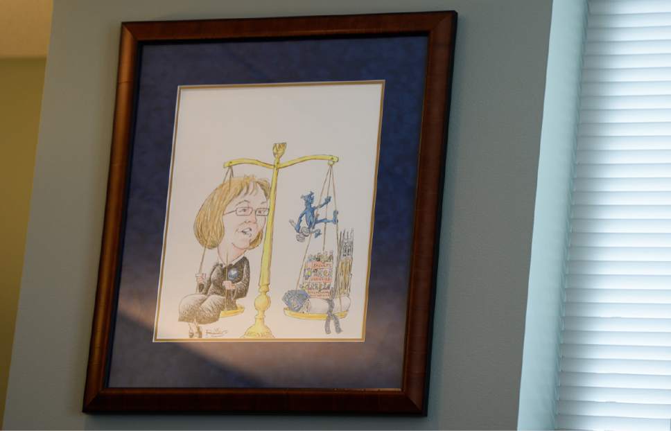 Francisco Kjolseth | The Salt Lake Tribune
A law school graduate from Duke University, Utah Supreme Court Justice Christine Durham keeps a framed cartoon of herself in her office with the Duke Blue Devil that she was gifted for her time on the board of trustees.. Durham who has been on the supreme court since 1982, sent a letter to Gov. Gary Herbert on Tuesday, May, 2, 2017, with her decision to retire from the bench effective Nov. 16 of this year.