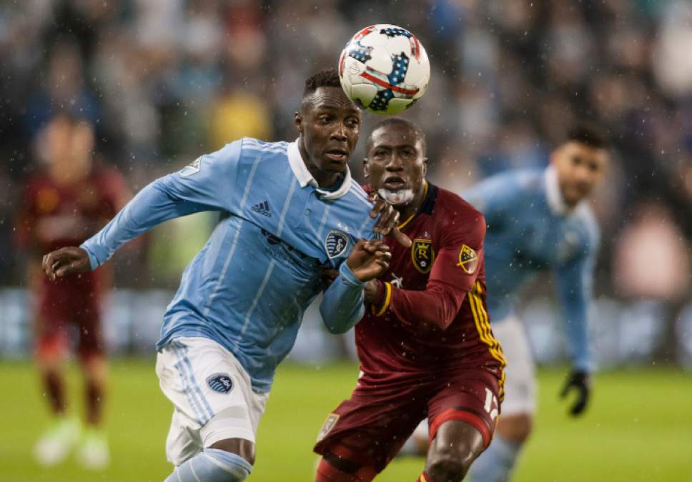 Sporting Kansas City forward Gerso (7) attempts to move past Real Salt Lake defender Demar Phillips (17) during aan MLS soccer match Saturday, April 29, 2017, in Kansas City, Kan. (Nick Tre. Smith/The Kansas City Star via AP)