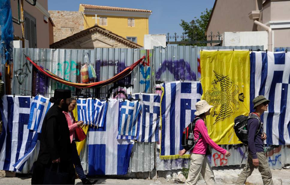 Greek poverty deepens during 7 years of austerity - The Salt Lake ...