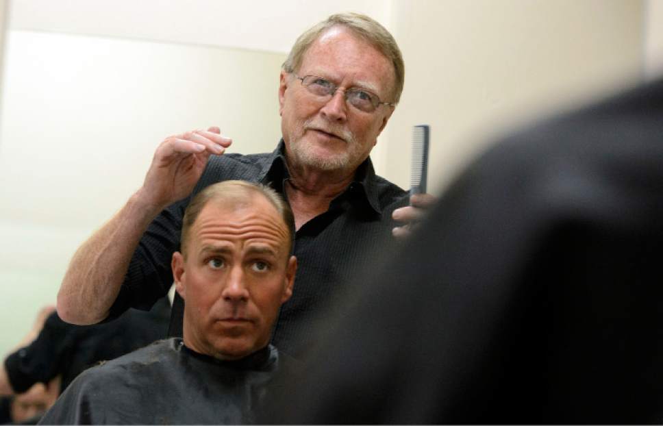 Steve Griffin  |  The Salt Lake Tribune


Stuart Stone cuts Brad Rubsam's hair at the Weigland Center in Salt Lake City Monday April 17, 2017. Stone as been volunteering his services giving haircuts to homeless individuals for some 20 years.