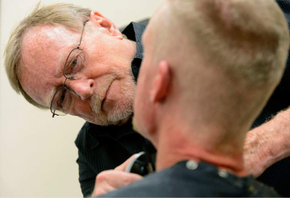 Steve Griffin  |  The Salt Lake Tribune


Stuart Stone  cuts a man's hair at the Weigland Center in Salt Lake City Monday April 17, 2017. Stone as been volunteering his services giving haircuts to homeless individuals for some 20 years.