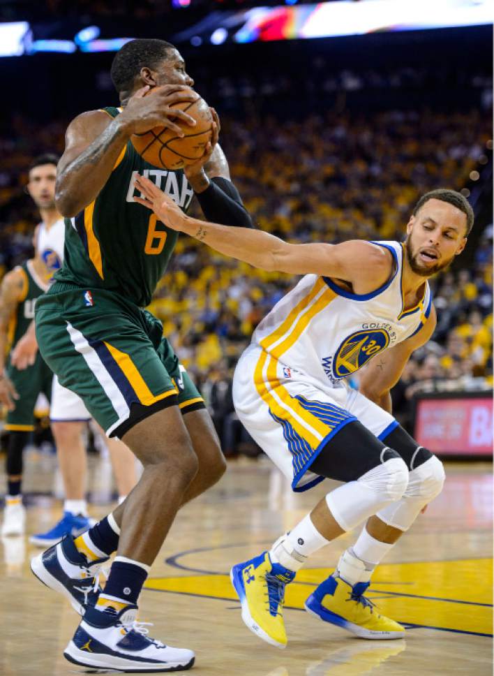 Steve Griffin  |  The Salt Lake Tribune


Golden State Warriors guard Stephen Curry (30) gets turned around as he tries to guard Utah Jazz forward Joe Johnson (6) during NBA playoff game between the Utah Jazz and the Golden State Warriors at Oracle Arena in Oakland Tuesday May 2, 2017.