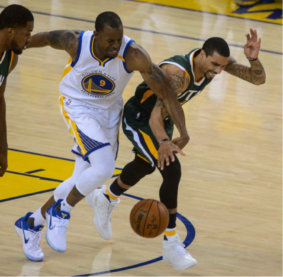 Steve Griffin  |  The Salt Lake Tribune


Golden State Warriors forward Andre Iguodala (9) battles Utah Jazz guard George Hill (3) as the run up the court during NBA playoff game between the Utah Jazz and the Golden State Warriors at Oracle Arena in Oakland Tuesday May 2, 2017.