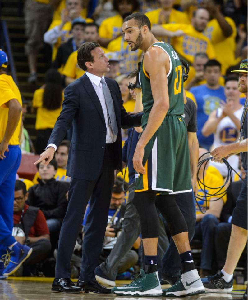 Steve Griffin  |  The Salt Lake Tribune


Utah Jazz head coach Quin Snyder talks with Utah Jazz center Rudy Gobert (27) during NBA playoff game between the Utah Jazz and the Golden State Warriors at Oracle Arena in Oakland Tuesday May 2, 2017.