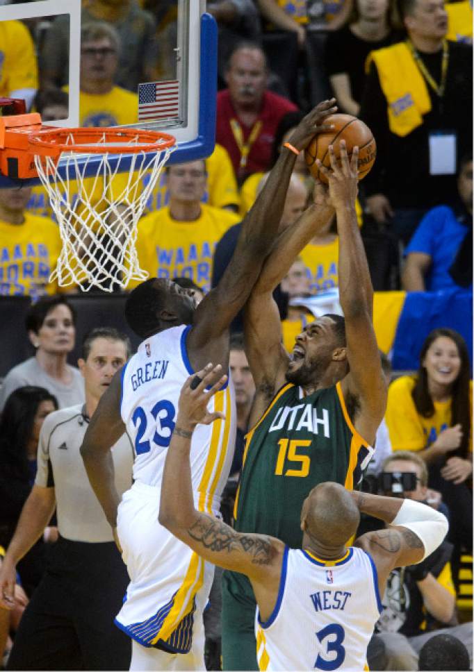 Steve Griffin  |  The Salt Lake Tribune


Golden State Warriors forward Draymond Green (23) blocks the shot of Utah Jazz forward Derrick Favors (15) during NBA playoff game between the Utah Jazz and the Golden State Warriors at Oracle Arena in Oakland Tuesday May 2, 2017.