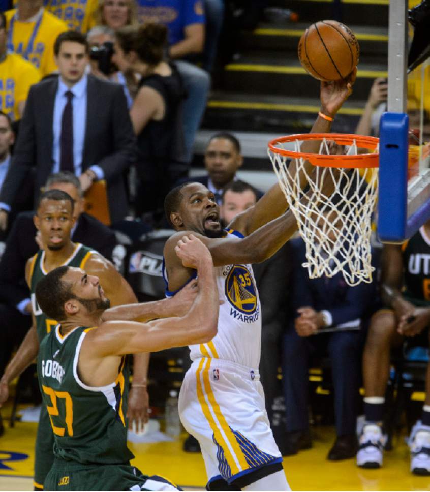 Steve Griffin  |  The Salt Lake Tribune


Golden State Warriors forward Kevin Durant (35) gets past Utah Jazz center Rudy Gobert (27) during NBA playoff game between the Utah Jazz and the Golden State Warriors at Oracle Arena in Oakland Tuesday May 2, 2017.