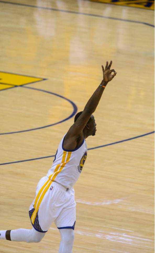 Steve Griffin  |  The Salt Lake Tribune


Golden State Warriors forward Draymond Green (23) holds up three fingers as he runs up court after nailing a big three late during NBA playoff game between the Utah Jazz and the Golden State Warriors at Oracle Arena in Oakland Tuesday May 2, 2017.