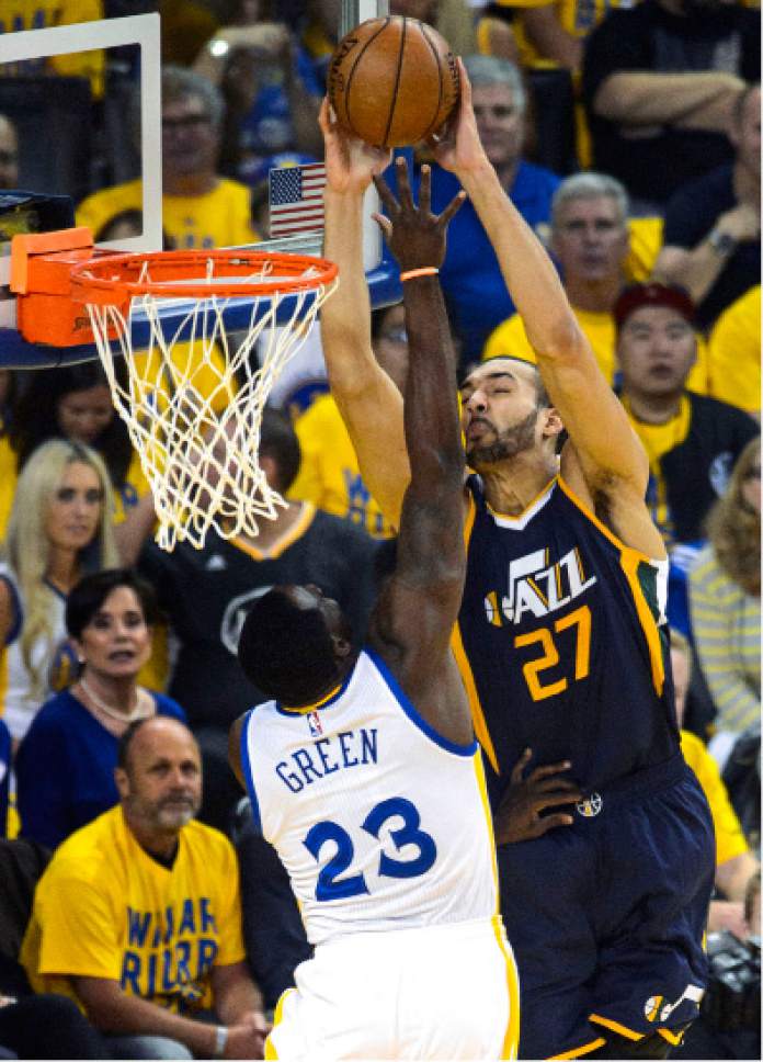 Steve Griffin  |  The Salt Lake Tribune


Golden State Warriors forward Draymond Green (23) blocks a dunk attempt by Utah Jazz center Rudy Gobert (27) during game 2 of the NBA playoff game between the Utah Jazz and the Golden State Warriors at Oracle Arena in Oakland Thursday May 4, 2017.